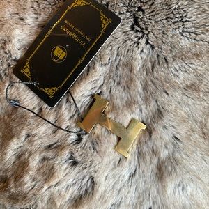 Hermès belt buckle (authenticity tag)